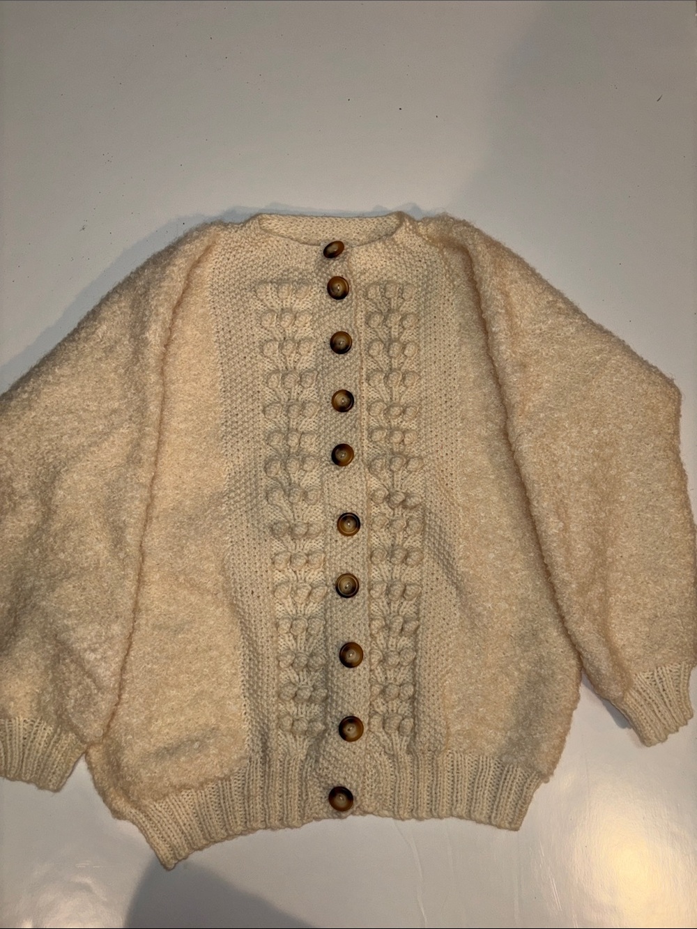 Astrakhan Knitwear 100% Wool
Ireland Cream Cable-Knit Button-Up cardigan Sweater